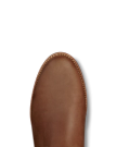 The Glen in Khaki Cowhide. A close-up of the toe area of a brown leather shoe crafted from supple cowhide, with visible stitching around the edge.
