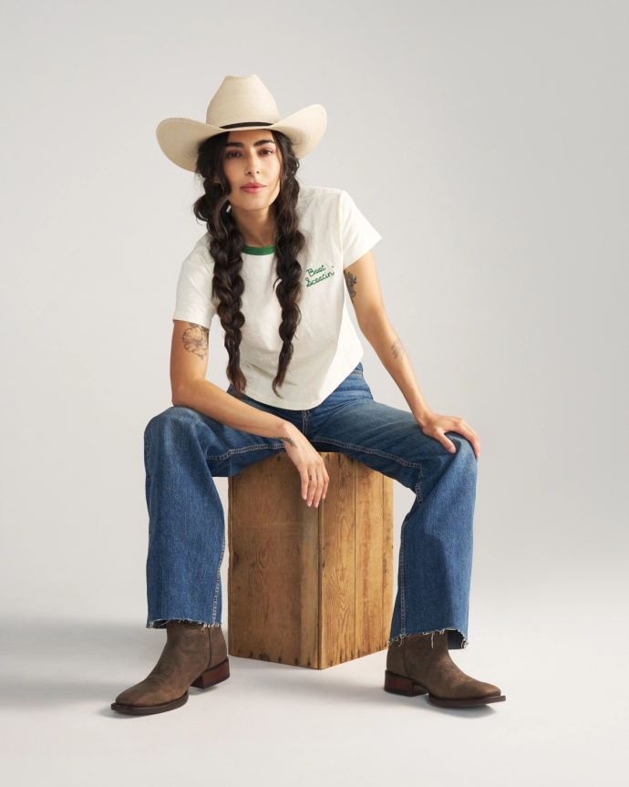 Full view of Women's Vintage Ringer Tee - Bone / Green on model