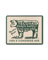 Illustration of a cow with text "Tecovas Ranch Supply," a phone number, and "1500 S Congress Ave" on a rectangular sign, styled with a vintage Western theme.