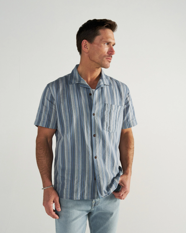 Front view of Men's Dobby Camp Shirt - Atlantic/Chambray on model
