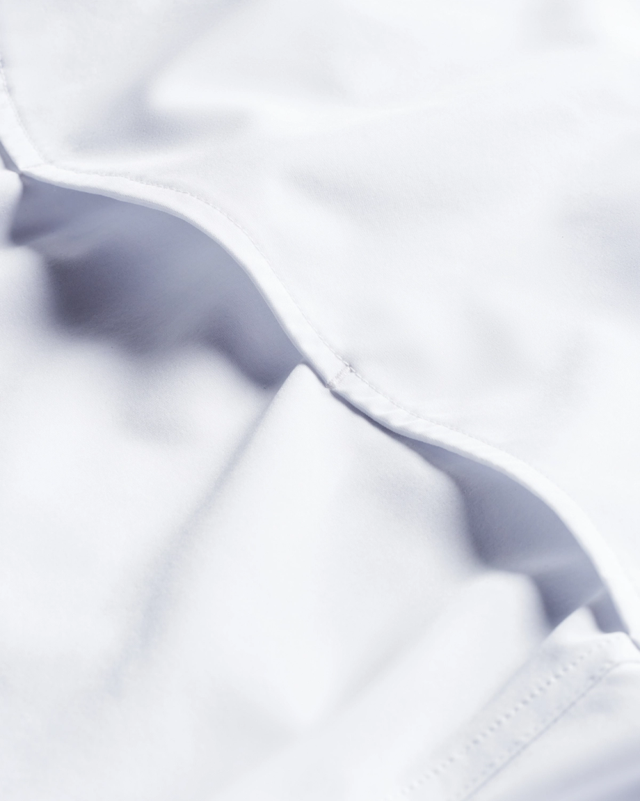 Closeup detail view of Men's Performance Western Pearl Snap SS - White