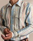 Closeup detail view of Men's Flying-T Foundation Weight Pearl Snap - Tan Multi Wide Stripe