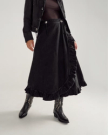 Front view of Women's Rodeo Maxi Denim Skirt - Black on model