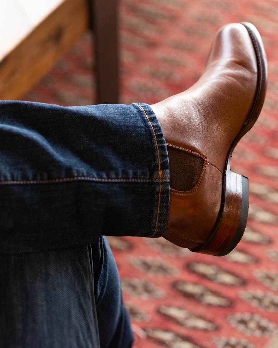 close up of Chance Chesnut Brown cowboy boots on a man's feet