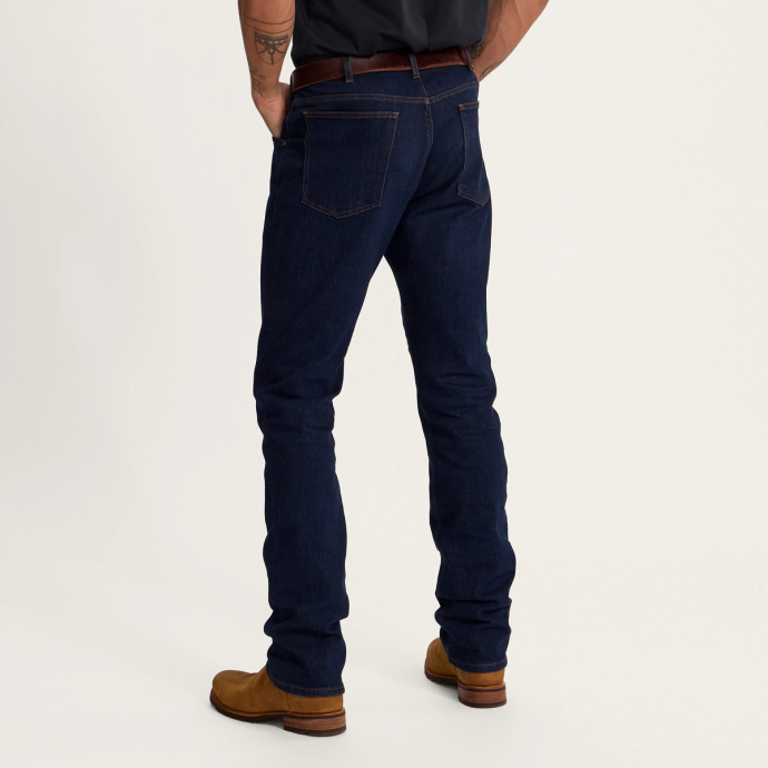 Back view of Men's Rugged Relaxed Jeans - Dark on plain background