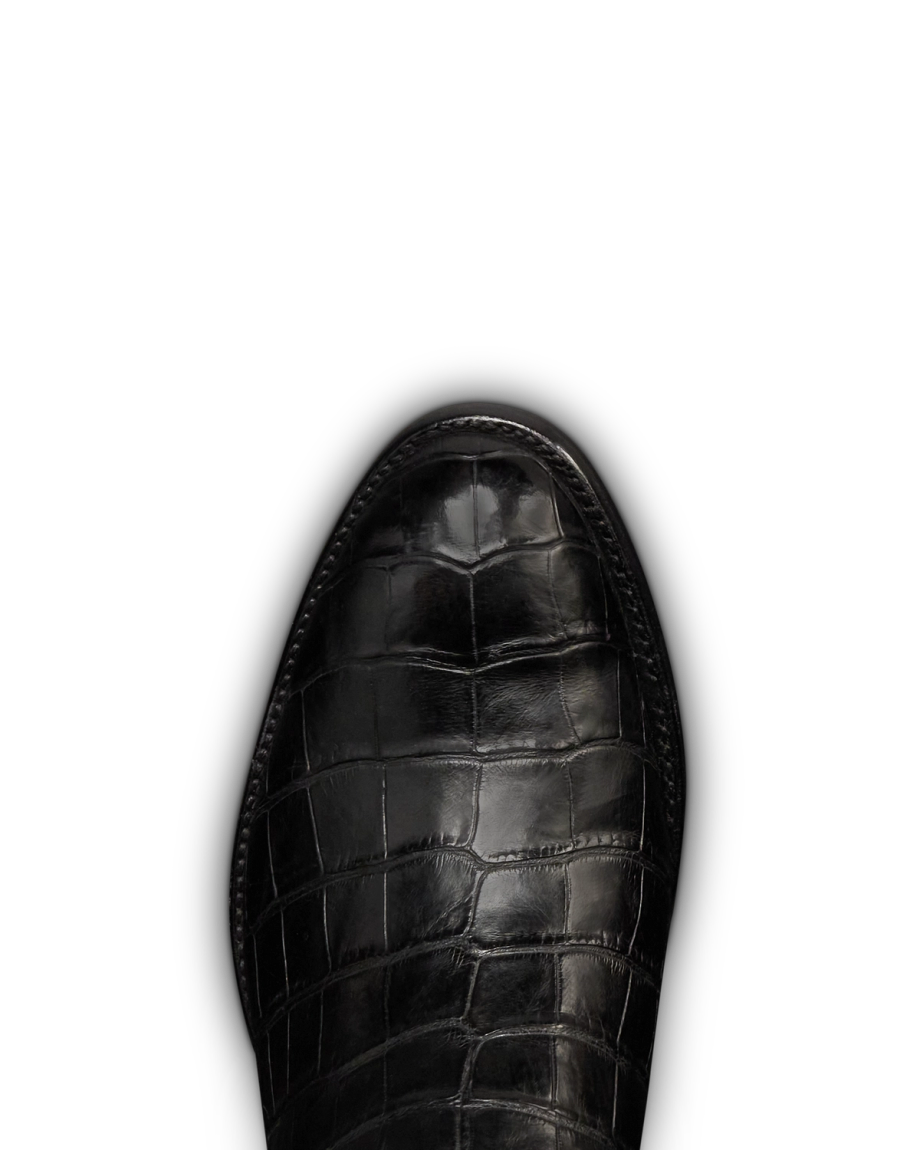 Toe view of The Stallion x Tecovas Boot - Midnight Giant Gator on plain background