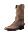 A single brown cowboy boot with decorative stitching, a pointed toe, and a low heel, displayed against a black background.