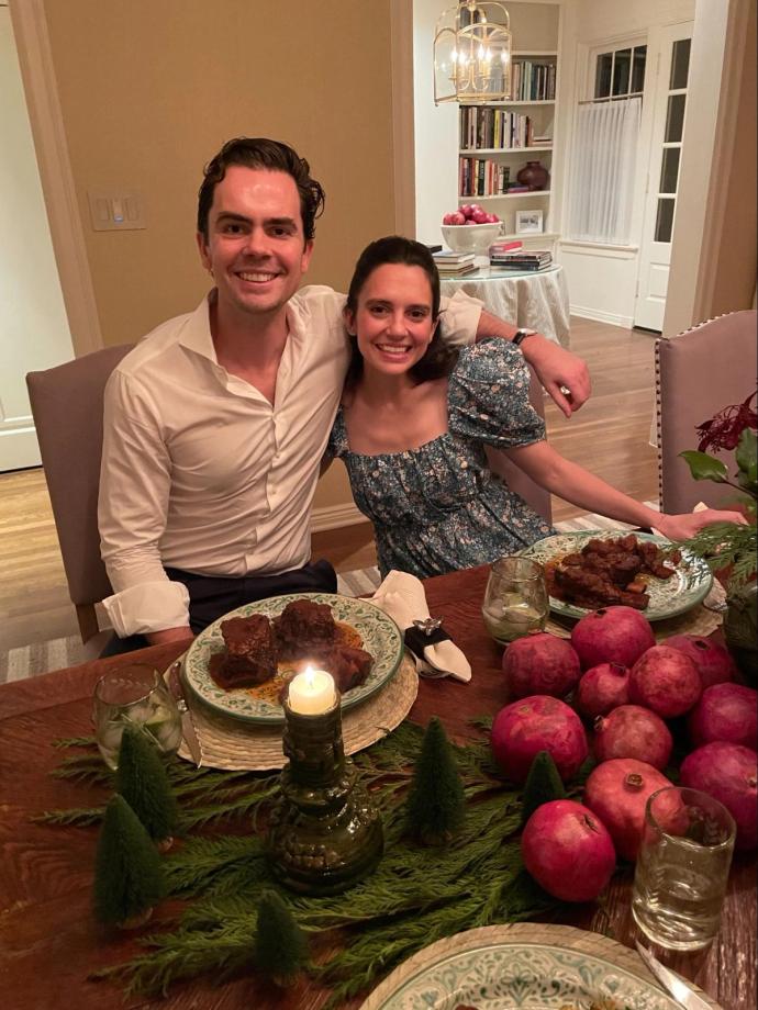 Harry and Cristina Lynch sitting by a dining table.