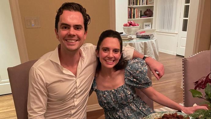 Harry and Cristina Lynch sitting by a dining table.