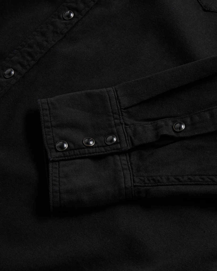 Closeup detail view of Men's Denim Long Sleeve Pearl Snap - Black