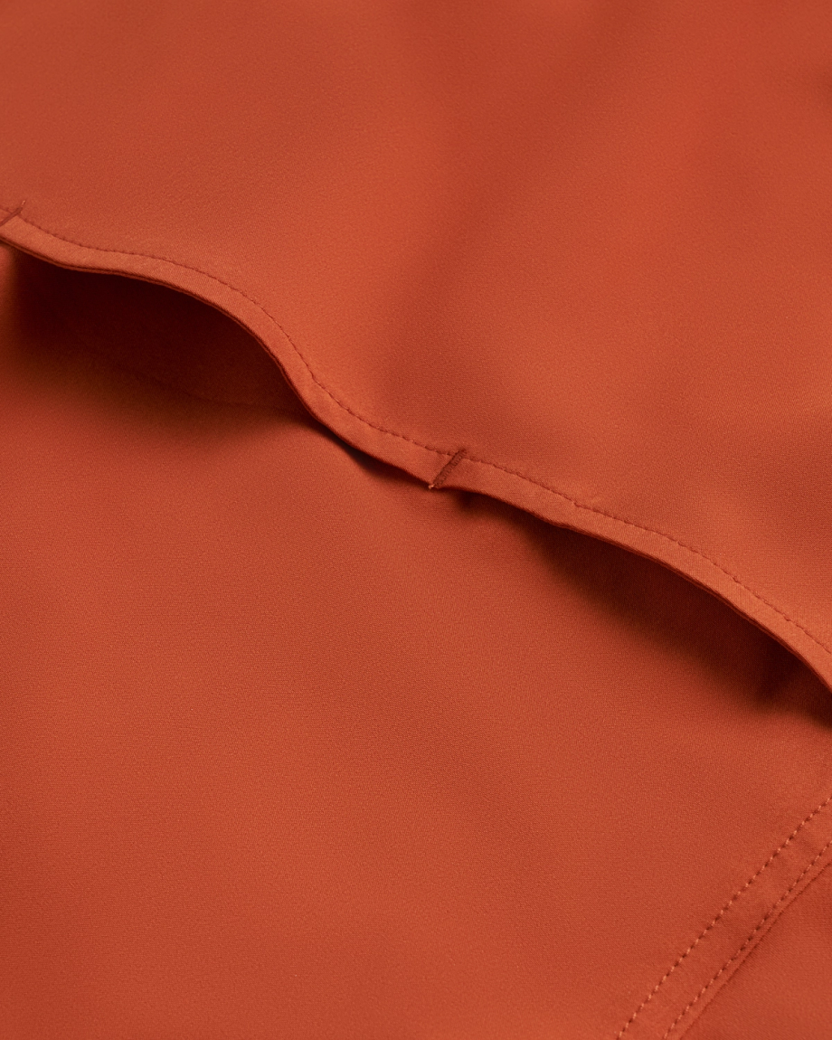 Closeup detail view of Men's Performance Western Pearl Snap SS - Orange Rust