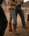 image of woman wearing jeans and boots