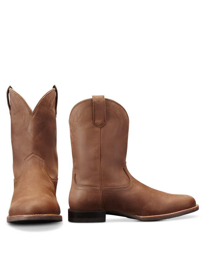 The Glen in Khaki Cowhide. A pair of brown cowhide leather cowboy boots, one facing forward and one showing a side view, both with low heels and pull tabs.