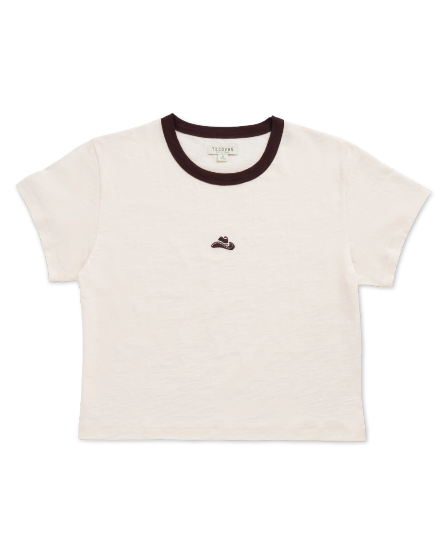 White short-sleeve ringer t-shirt with black collar trim and a small embroidered sneaker design on the chest.