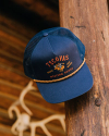 Profile view of Jackelope Five-Panel High Profile Trucker - Navy on plain background