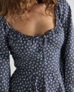 Closeup detail view of Women's L/S Mini Dress - Navy / Bone