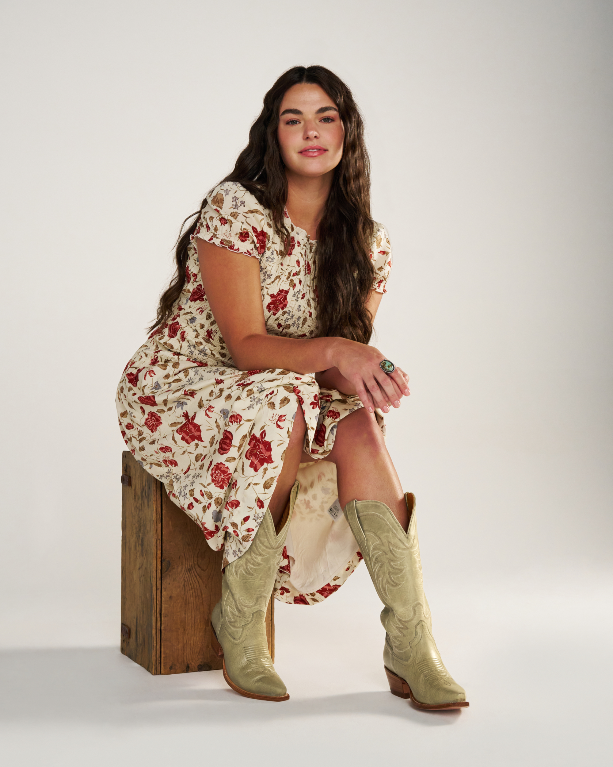 Full view of The Annie Wide Calf - Light Sage Cowhide on model