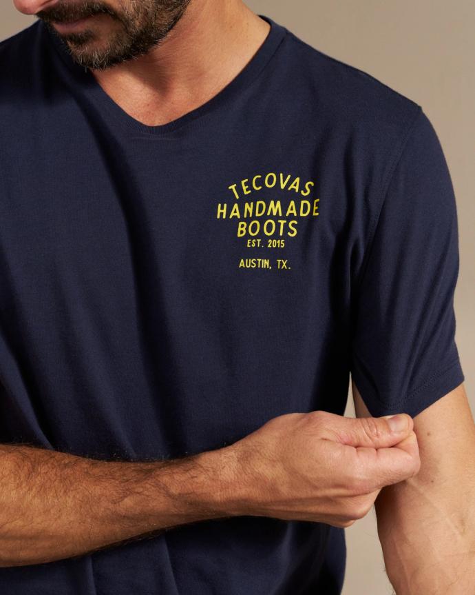 Closeup of man wearing a t shirt in a photo studio