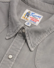 Closeup detail view of Men's Denim Short Sleeve Pearl Snap - Light Gray