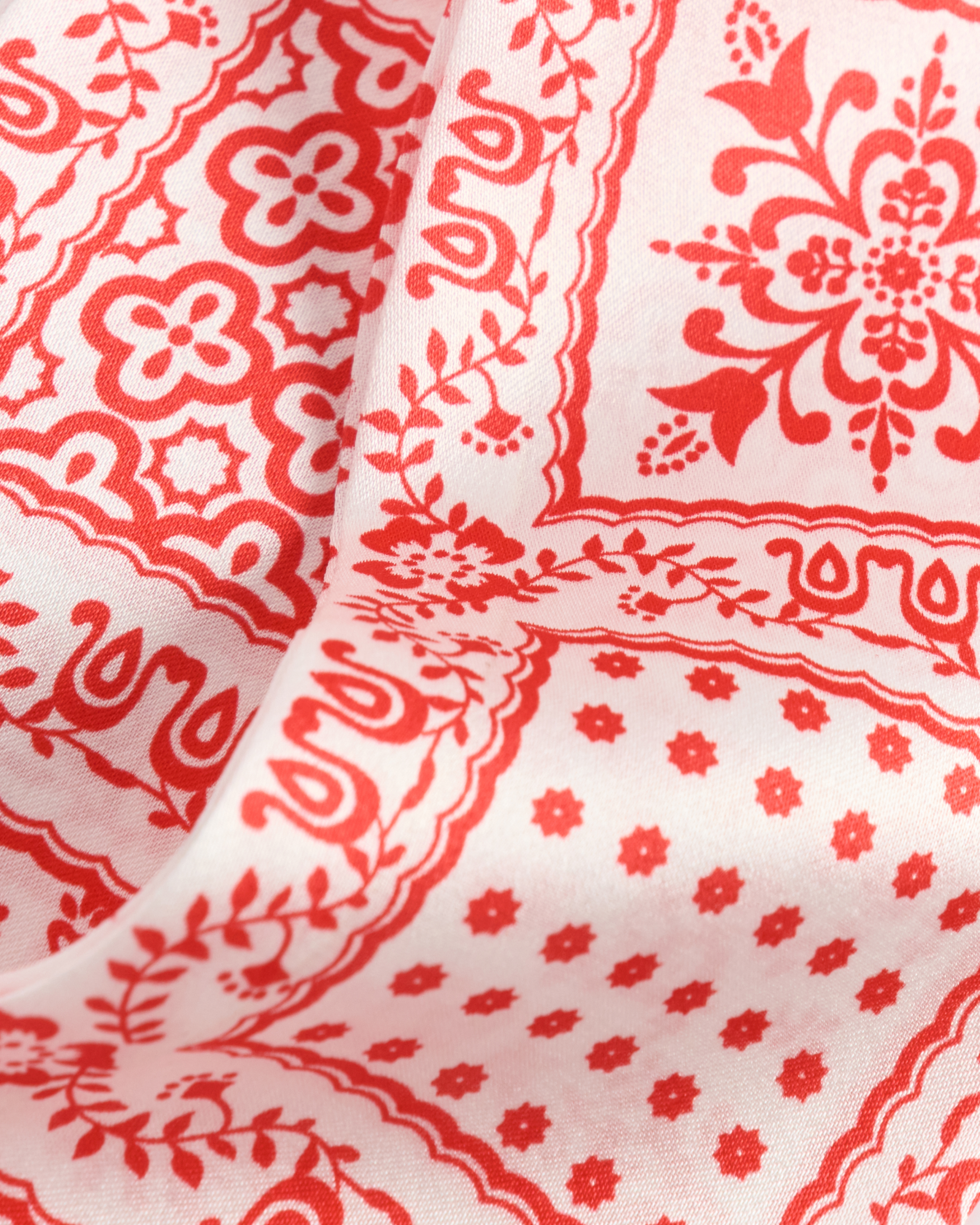 Closeup view of Bandana Ribbon Scarf - Red / Cream