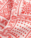 Closeup view of Bandana Ribbon Scarf - Red / Cream