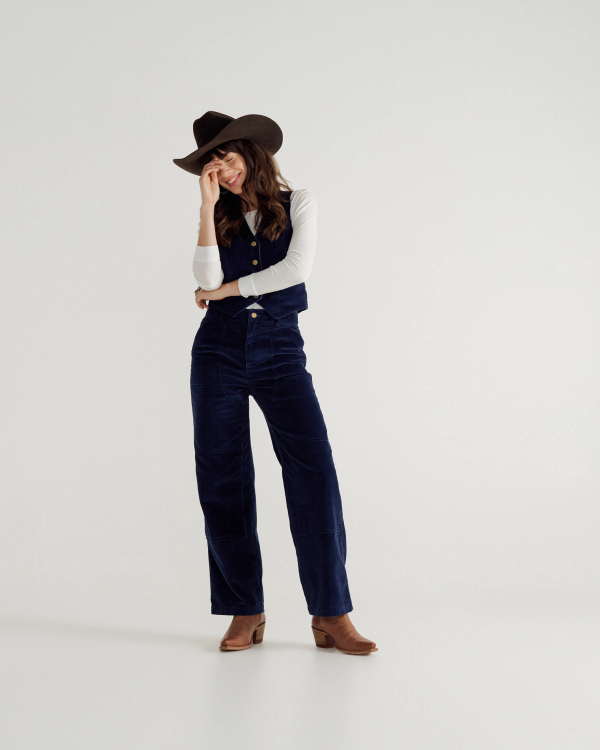 Full view of Women's Corduroy Carpenter Pant - Navy on model
