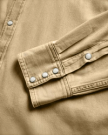 Closeup detail view of Men's Denim Long Sleeve Pearl Snap - Coriander