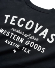 Black T-shirt with white text reading "Tecovas maker of fine Western goods Austin, Tex." and a small Texas silhouette graphic.