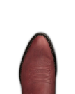 The Britt in Redwood Goat. Close-up of a maroon Redwood Goat leather cowboy boot toe with decorative stitching, shown against a plain white background.