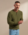 Front view of Men's Henley Sweater - Olive Heather on model