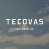 White text "TECOVAS CARLSBAD, CA" is centered on a blue sky background with scattered clouds.