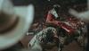 bullrider riding on top of a bull