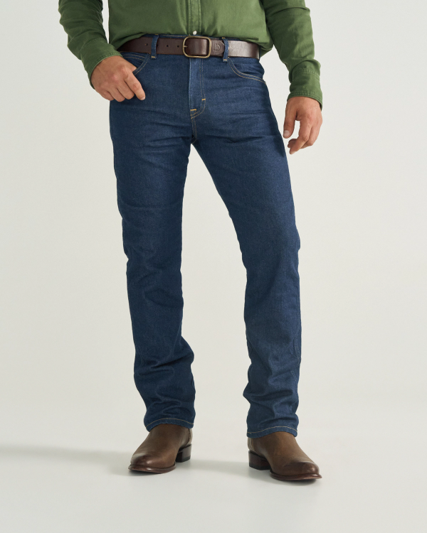 Front view of Men's Slim Straight Heritage Denim - Dark Blue on model