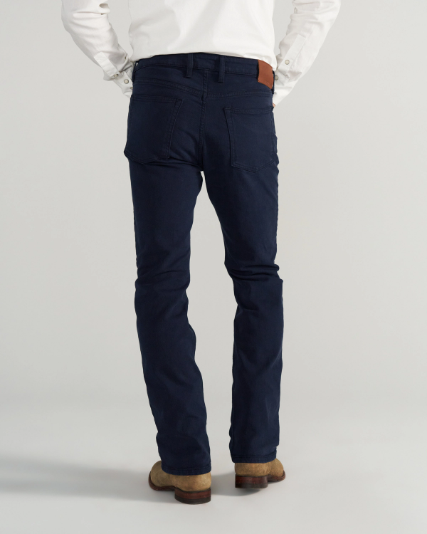 Back view of Men's Slim Straight Stretch Twill - Dark Navy on model