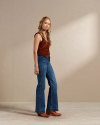 Full view of Women's High-Rise Flare Jeans (II) - Medium on model