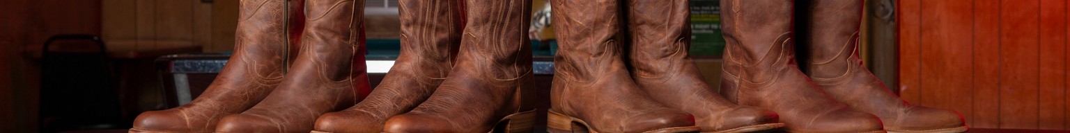 A row of cowboy boots.