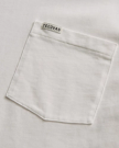 Closeup detail view of Standard Issue Pocket Tee - Bone