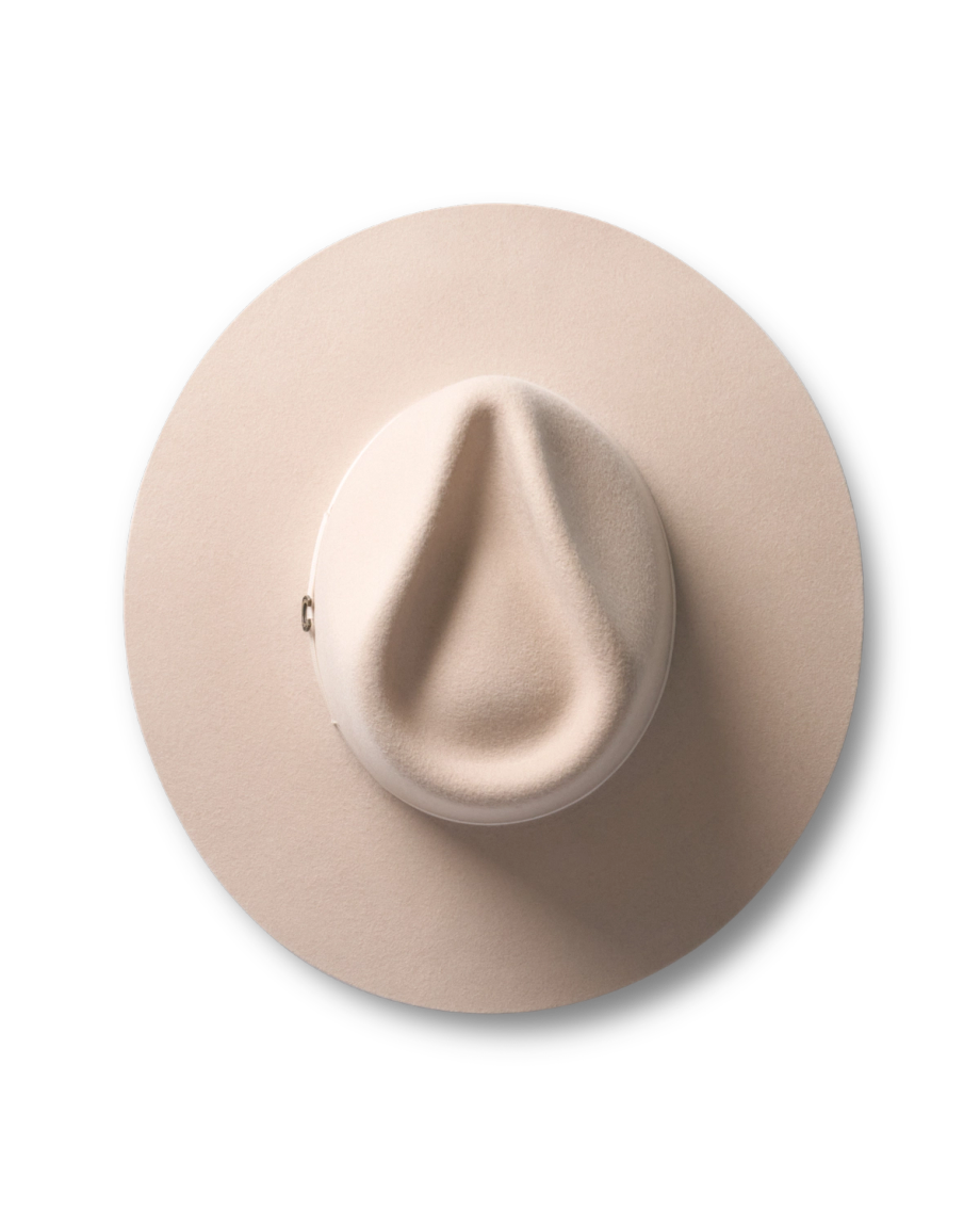 Top view of The Belle Wool Cowgirl Hat - Cream on plain background