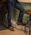 close up of Chance Chesnut Brown cowboy boots on a man's feet 