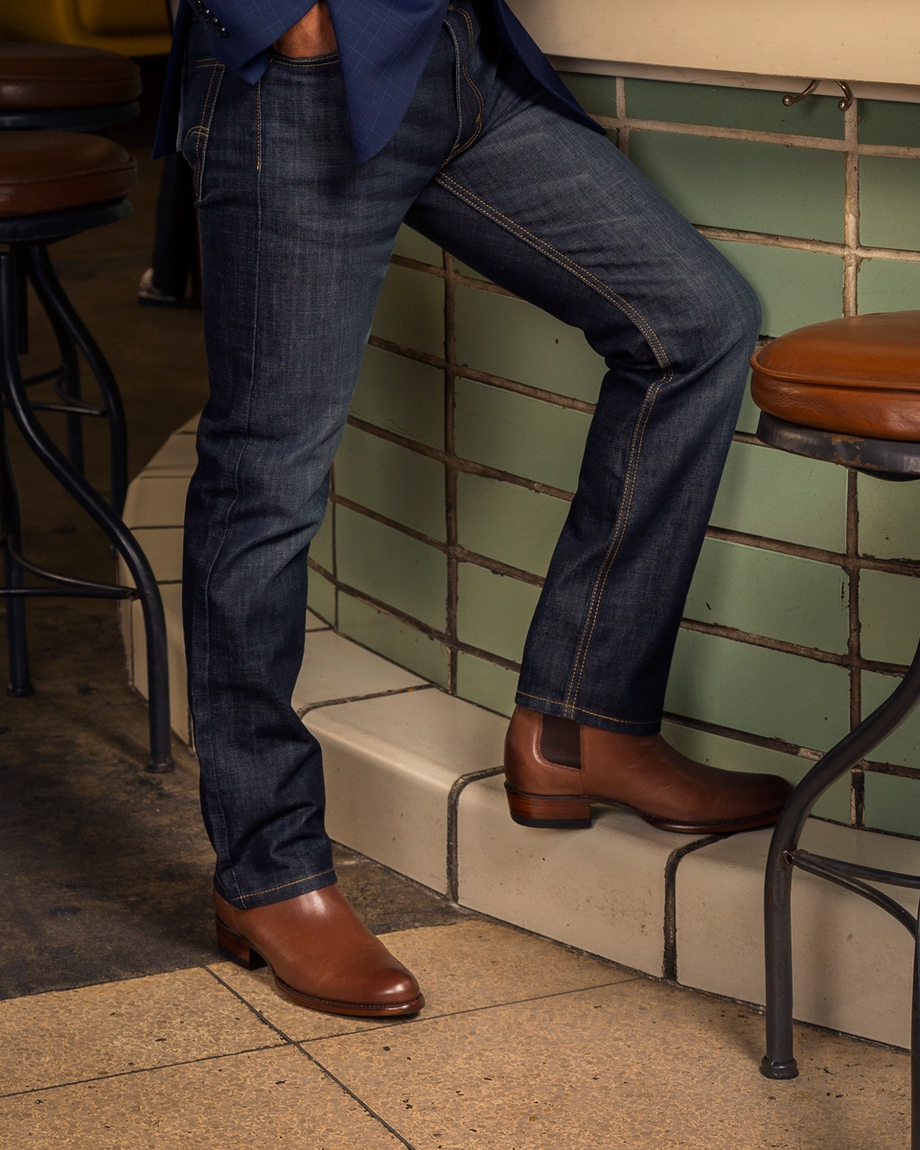 close up of Chance Chesnut Brown cowboy boots on a man's feet