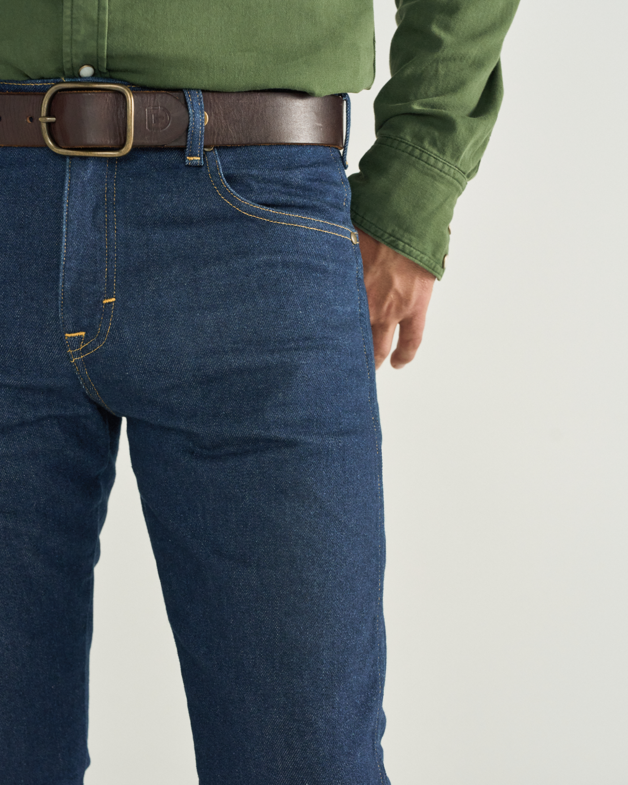 Closeup detail view of Men's Slim Straight Heritage Denim - Dark Blue