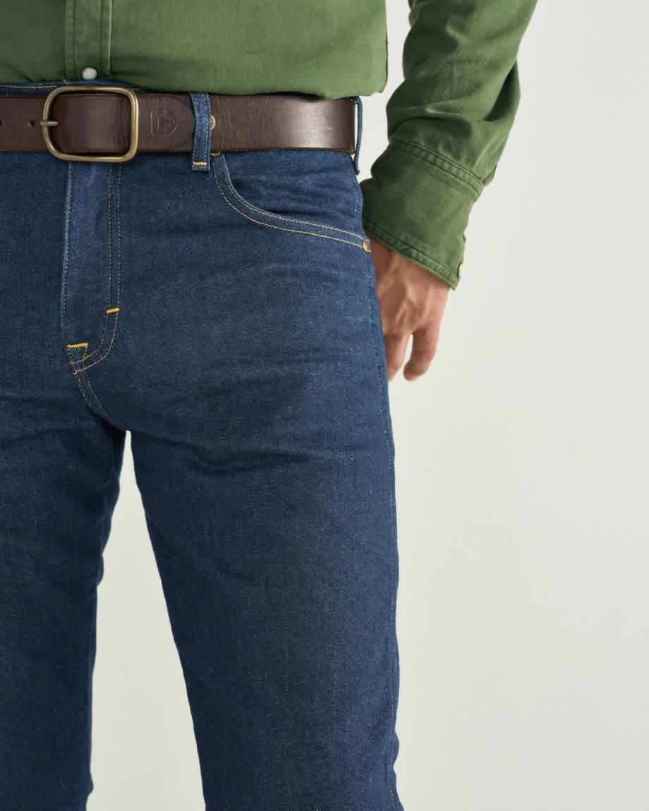 Closeup detail view of Men's Slim Straight Heritage Denim - Dark Blue