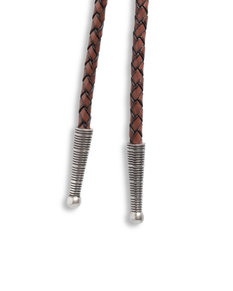 Closeup view of Iron Lamb Turquoise Drop Bolo - Turquoise/Brown