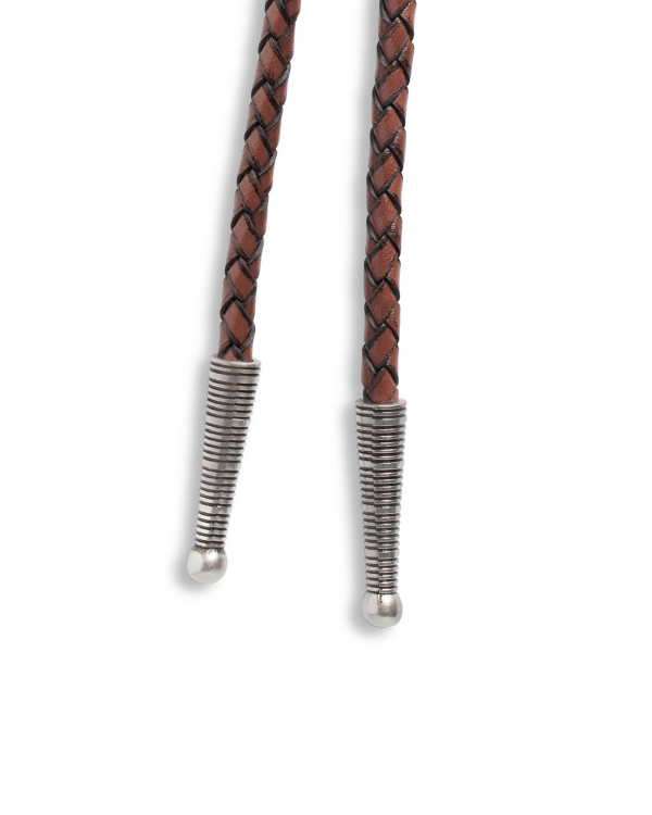 Closeup view of Iron Lamb Turquoise Drop Bolo - Turquoise/Brown