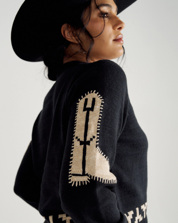 Front view of Women's Crew Neck Lucky Boots Sweater - Black on model