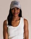 Front view of Women's Scoop Neck Ribbed Tank - White on model