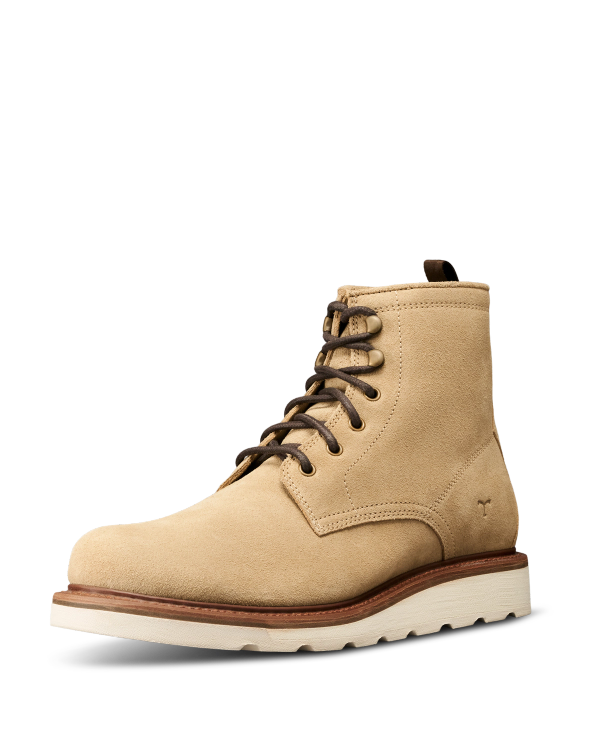 The Knox Lace Up Shearling in Sandstone Roughout. A tan sandstone roughout suede lace-up boot with a white sole and brown laces, displayed on a white background.