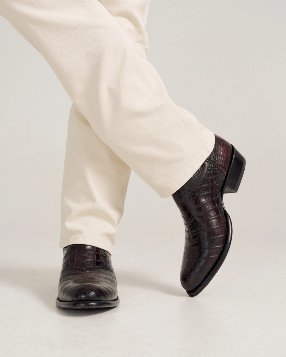 close up of Cooper Black Cherry Cowboy Boot on a man's feet