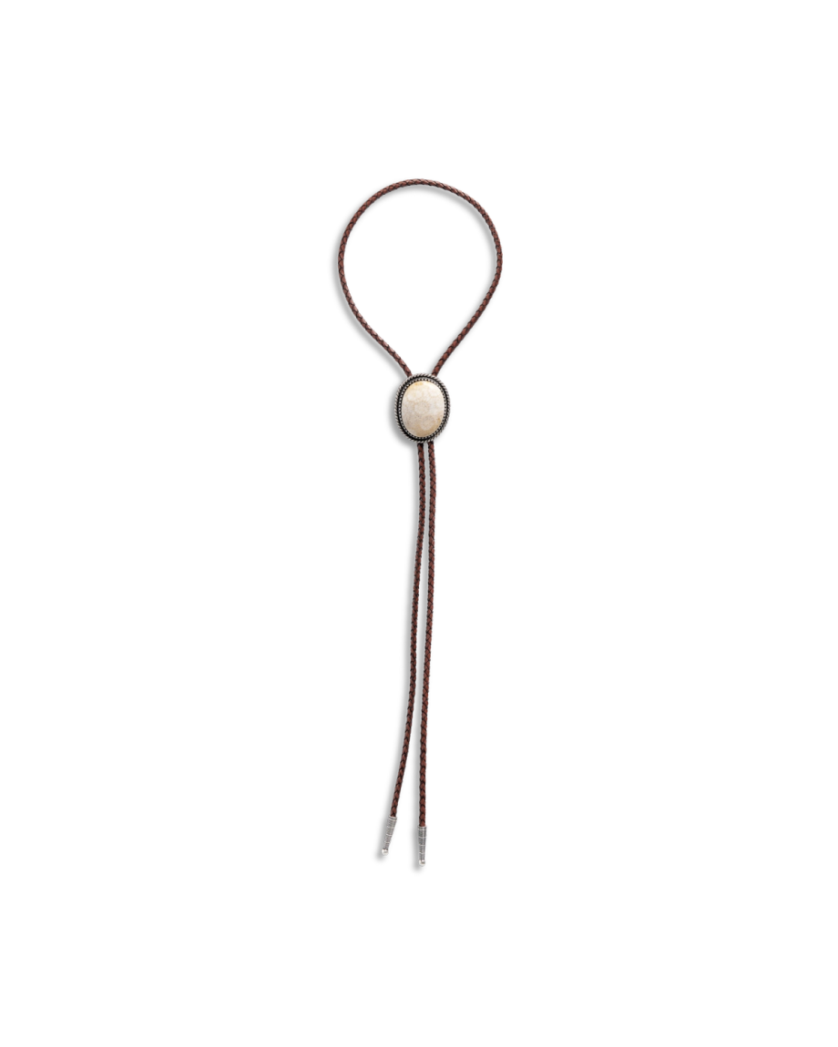 Front view of Iron Lamb Fossilized Coral Bolo - Cream / Black on plain background
