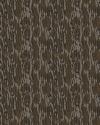 A seamless camouflage pattern featuring irregular brown, black, and gray shapes resembling tree bark or forest terrain.